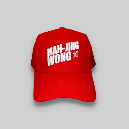 Red cap with white text on a gray background
